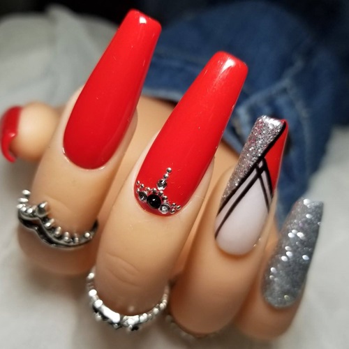 Elegant Crimson Swirl Nails